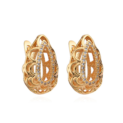 Aretes dorados calados con cristales