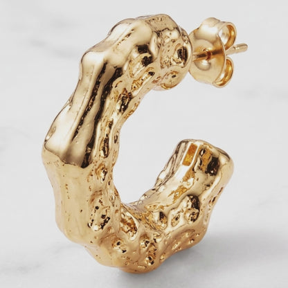 Argollas Abiertas · Textura Fundida